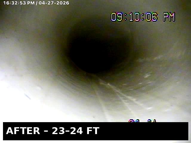 AFTER — 23-24 ft: same section of pipe, fully cleared with our root-cutting hydro jetter. Smooth walls, full diameter restored, and video-verified.